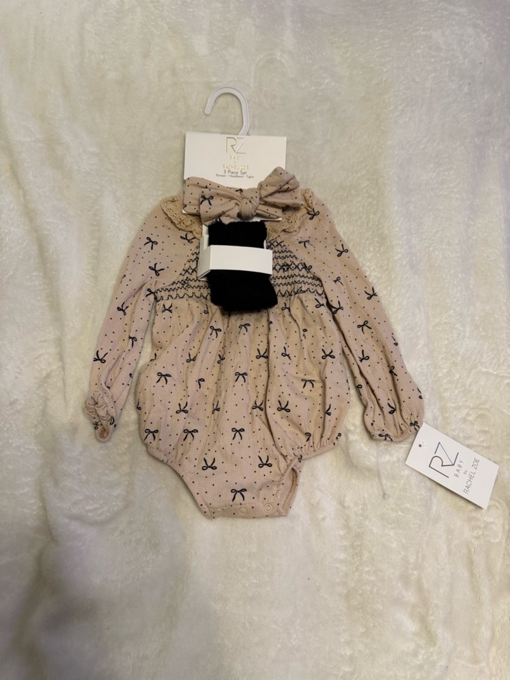 RZ Baby Bow Print Long Sleeve Romper in Beige with Black Bows